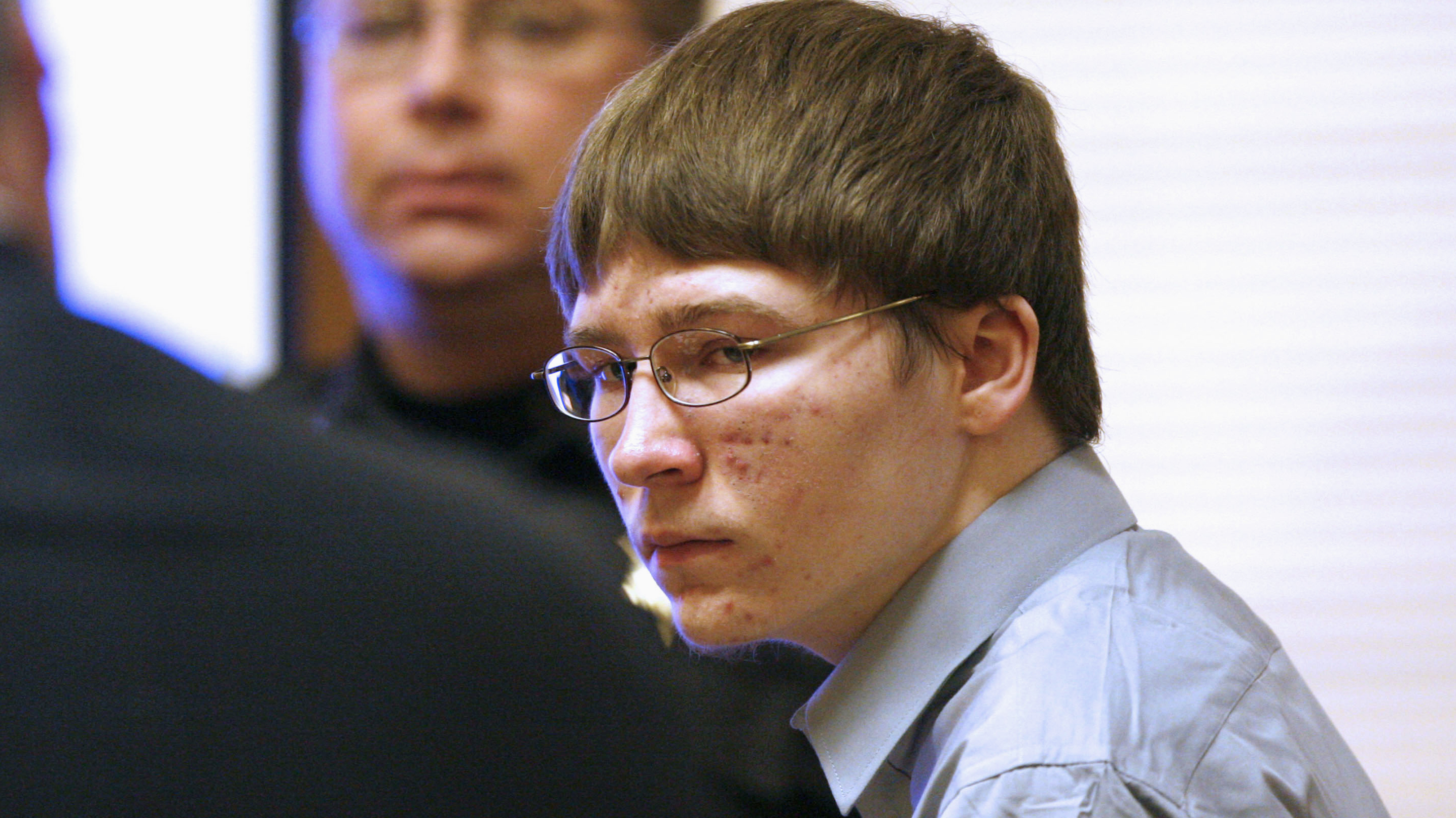 Brendan Dassey seated in a courtroom during his 2007 trial in Wisconsin, photographed from the gallery.
