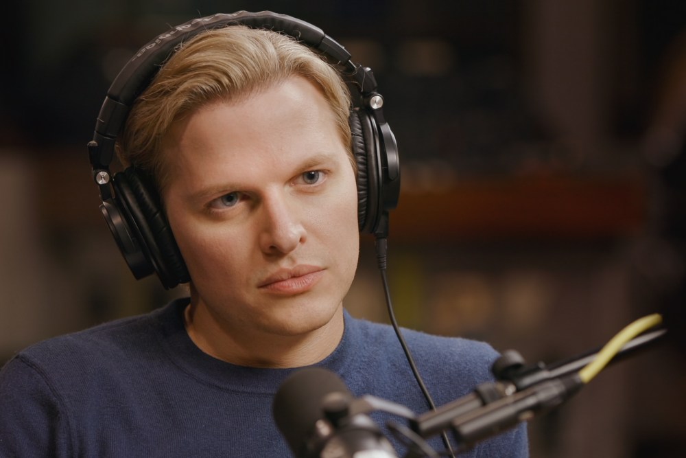 Ronan Farrow appearing at an event connected to his book 'Catch and Kill' about investigative reporting and accountability